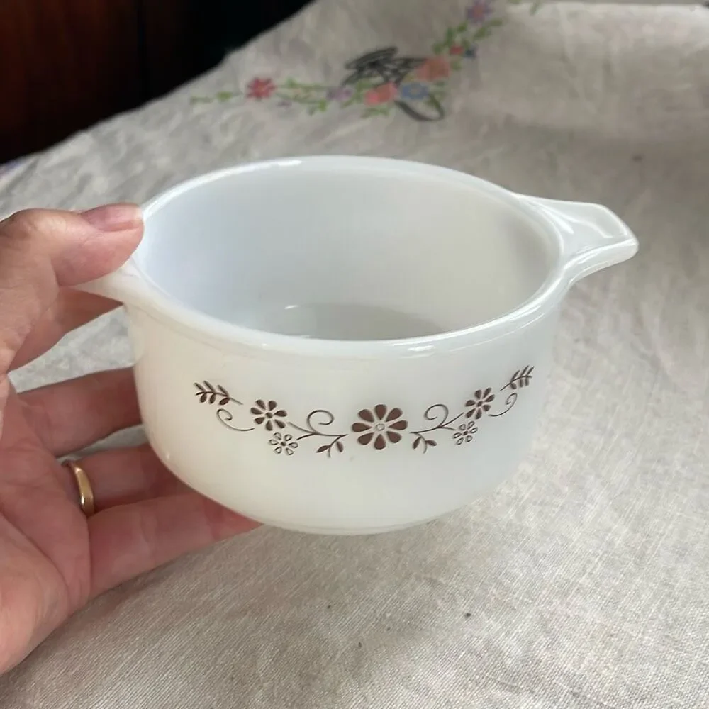 Vintage brown Daisy Dynaware Pyr-O-Rey casserole dish.
